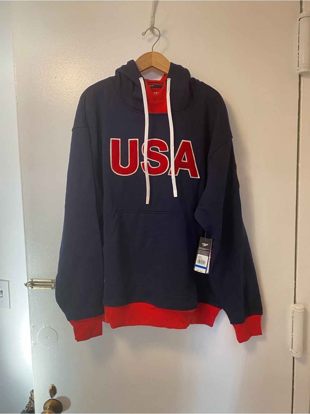 Speedo Navy Hoodie with Red USA Applique and White Drawstrings. Size XL